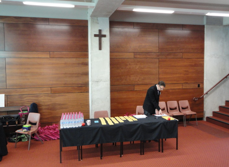 Photo: Brad Gobby at registration desk